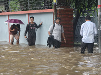 Continuous rain causes waterlogging in different areas of the capital, disrupting the daily life of the residents, on October 5, 2024. (