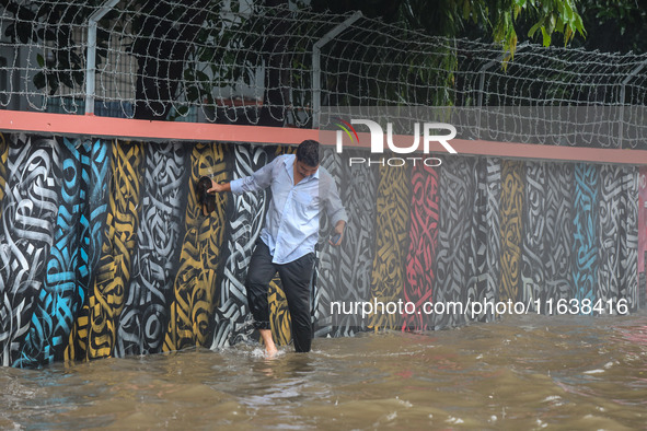 Continuous rain causes waterlogging in different areas of the capital, disrupting the daily life of the residents, on October 5, 2024. 