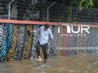 Continuous rain causes waterlogging in different areas of the capital, disrupting the daily life of the residents, on October 5, 2024. (