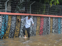 Continuous rain causes waterlogging in different areas of the capital, disrupting the daily life of the residents, on October 5, 2024. (