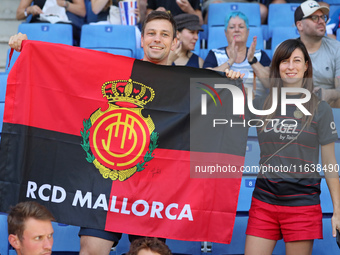 RCD Mallorca supporters attend the match between RCD Espanyol and RCD Mallorca during week 9 of LaLiga EA Sports at the RCDE Stadium in Barc...