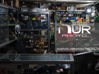 A man works at the vehicle parts shop in Colombo, Sri Lanka, on October 5, 2024 (