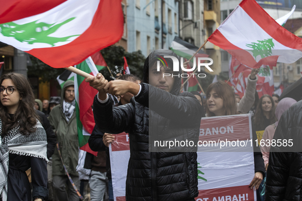 Demonstrators march through the streets of Sofia, Bulgaria, on October 5, 2024, against Israeli strikes in Gaza and Lebanon. 