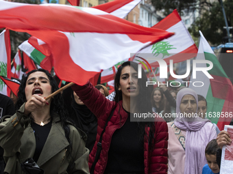 Demonstrators march through the streets of Sofia, Bulgaria, on October 5, 2024, against Israeli strikes in Gaza and Lebanon. (