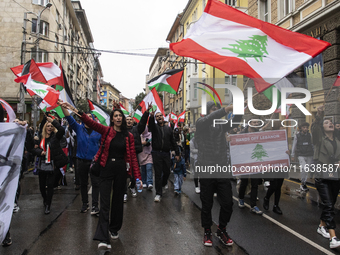 Demonstrators march through the streets of Sofia, Bulgaria, on October 5, 2024, against Israeli strikes in Gaza and Lebanon. (