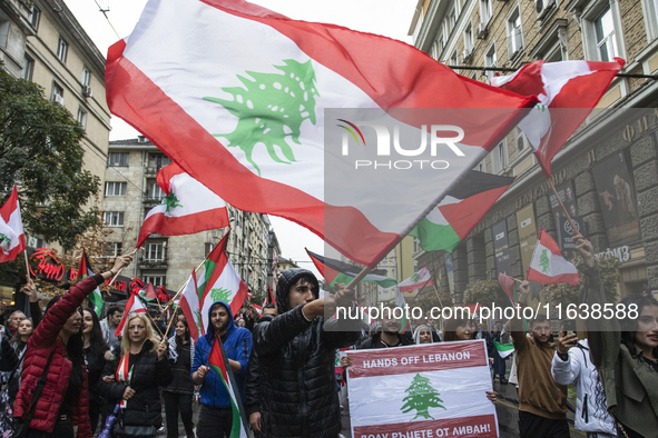 Demonstrators march through the streets of Sofia, Bulgaria, on October 5, 2024, against Israeli strikes in Gaza and Lebanon. 