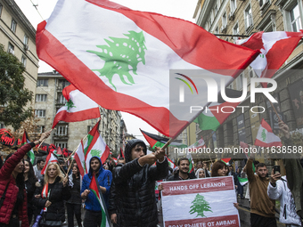 Demonstrators march through the streets of Sofia, Bulgaria, on October 5, 2024, against Israeli strikes in Gaza and Lebanon. (