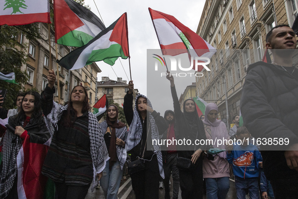 Demonstrators march through the streets of Sofia, Bulgaria, on October 5, 2024, against Israeli strikes in Gaza and Lebanon. 