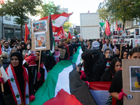 A thousand protesters take part in a protest demanding a ceasefire and opposing ongoing Israeli attacks on Gaza and Lebanon in Duesseldorf,...