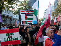 A thousand protesters take part in a protest demanding a ceasefire and opposing ongoing Israeli attacks on Gaza and Lebanon in Duesseldorf,...