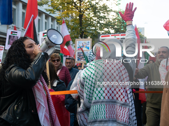 A thousand protesters take part in a protest demanding a ceasefire and opposing ongoing Israeli attacks on Gaza and Lebanon in Duesseldorf,...