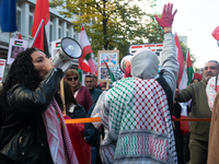 A thousand protesters take part in a protest demanding a ceasefire and opposing ongoing Israeli attacks on Gaza and Lebanon in Duesseldorf,...