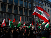 A thousand protesters take part in a protest demanding a ceasefire and opposing ongoing Israeli attacks on Gaza and Lebanon in Duesseldorf,...