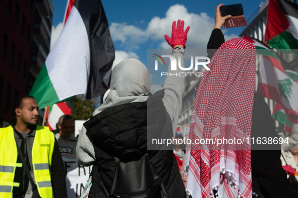 A thousand protesters take part in a protest demanding a ceasefire and opposing ongoing Israeli attacks on Gaza and Lebanon in Duesseldorf,...