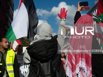 A thousand protesters take part in a protest demanding a ceasefire and opposing ongoing Israeli attacks on Gaza and Lebanon in Duesseldorf,...