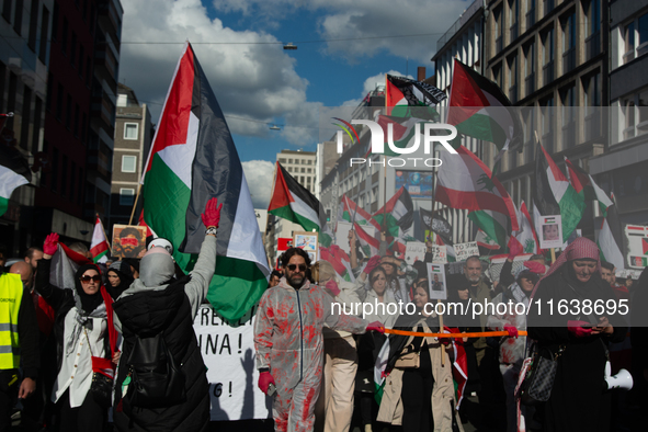 A thousand protesters take part in a protest demanding a ceasefire and opposing ongoing Israeli attacks on Gaza and Lebanon in Duesseldorf,...