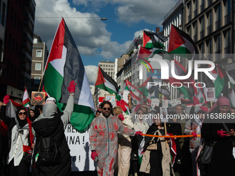 A thousand protesters take part in a protest demanding a ceasefire and opposing ongoing Israeli attacks on Gaza and Lebanon in Duesseldorf,...