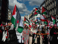 A thousand protesters take part in a protest demanding a ceasefire and opposing ongoing Israeli attacks on Gaza and Lebanon in Duesseldorf,...