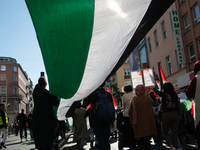 A thousand protesters take part in a protest demanding a ceasefire and opposing ongoing Israeli attacks on Gaza and Lebanon in Duesseldorf,...