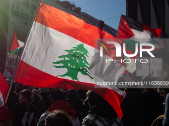 A thousand protesters take part in a protest demanding a ceasefire and opposing ongoing Israeli attacks on Gaza and Lebanon in Duesseldorf,...