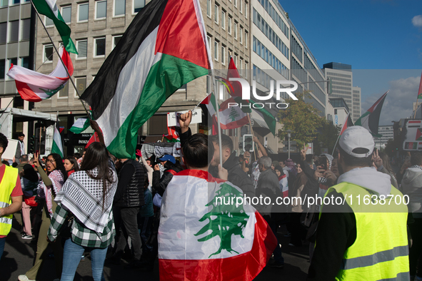 A thousand protesters take part in a protest demanding a ceasefire and opposing ongoing Israeli attacks on Gaza and Lebanon in Duesseldorf,...