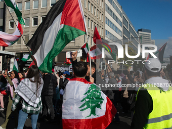 A thousand protesters take part in a protest demanding a ceasefire and opposing ongoing Israeli attacks on Gaza and Lebanon in Duesseldorf,...