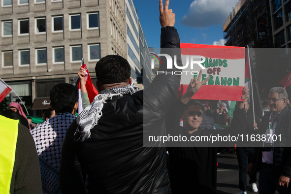 A thousand protesters take part in a protest demanding a ceasefire and opposing ongoing Israeli attacks on Gaza and Lebanon in Duesseldorf,...