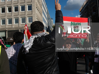 A thousand protesters take part in a protest demanding a ceasefire and opposing ongoing Israeli attacks on Gaza and Lebanon in Duesseldorf,...