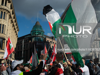 A thousand protesters take part in a protest demanding a ceasefire and opposing ongoing Israeli attacks on Gaza and Lebanon in Duesseldorf,...