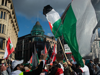 A thousand protesters take part in a protest demanding a ceasefire and opposing ongoing Israeli attacks on Gaza and Lebanon in Duesseldorf,...