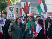 A thousand protesters take part in a protest demanding a ceasefire and opposing ongoing Israeli attacks on Gaza and Lebanon in Duesseldorf,...