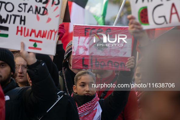 A thousand protesters take part in a protest demanding a ceasefire and opposing ongoing Israeli attacks on Gaza and Lebanon in Duesseldorf,...