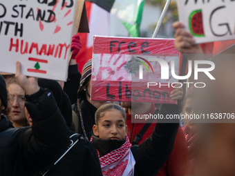 A thousand protesters take part in a protest demanding a ceasefire and opposing ongoing Israeli attacks on Gaza and Lebanon in Duesseldorf,...