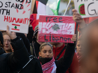 A thousand protesters take part in a protest demanding a ceasefire and opposing ongoing Israeli attacks on Gaza and Lebanon in Duesseldorf,...