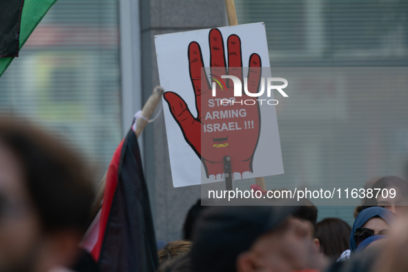 A thousand protesters take part in a protest demanding a ceasefire and opposing ongoing Israeli attacks on Gaza and Lebanon in Duesseldorf,...