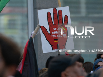 A thousand protesters take part in a protest demanding a ceasefire and opposing ongoing Israeli attacks on Gaza and Lebanon in Duesseldorf,...