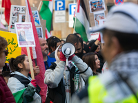 A thousand protesters take part in a protest demanding a ceasefire and opposing ongoing Israeli attacks on Gaza and Lebanon in Duesseldorf,...