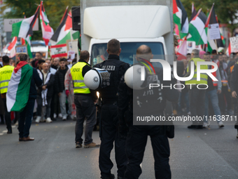 A thousand protesters take part in a protest demanding a ceasefire and opposing ongoing Israeli attacks on Gaza and Lebanon in Duesseldorf,...