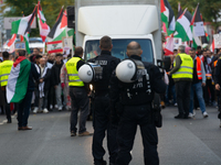 A thousand protesters take part in a protest demanding a ceasefire and opposing ongoing Israeli attacks on Gaza and Lebanon in Duesseldorf,...