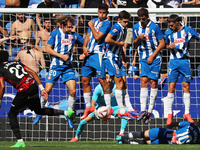 The RCD Espanyol barrier protects a free kick from Johan Mojica during the match between RCD Espanyol and RCD Mallorca in week 9 of LaLiga E...