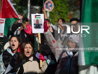 A thousand protesters take part in a protest demanding a ceasefire and opposing ongoing Israeli attacks on Gaza and Lebanon in Duesseldorf,...