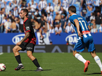 Sergi Darder and Jofre Carreras play during the match between RCD Espanyol and RCD Mallorca in week 9 of LaLiga EA Sports at the RCDE Stadiu...