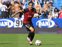 Omar Mascarell plays during the match between RCD Espanyol and RCD Mallorca in week 9 of LaLiga EA Sports at the RCDE Stadium in Barcelona,...