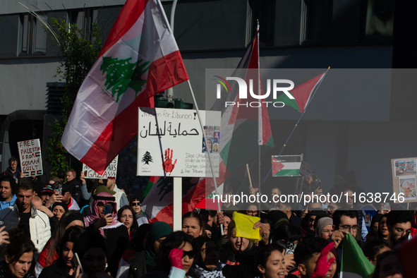 A thousand protesters take part in a protest demanding a ceasefire and opposing ongoing Israeli attacks on Gaza and Lebanon in Duesseldorf,...