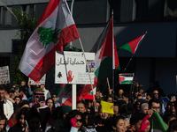 A thousand protesters take part in a protest demanding a ceasefire and opposing ongoing Israeli attacks on Gaza and Lebanon in Duesseldorf,...