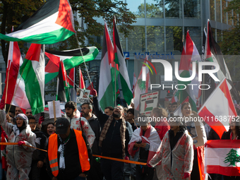 A thousand protesters take part in a protest demanding a ceasefire and opposing ongoing Israeli attacks on Gaza and Lebanon in Duesseldorf,...