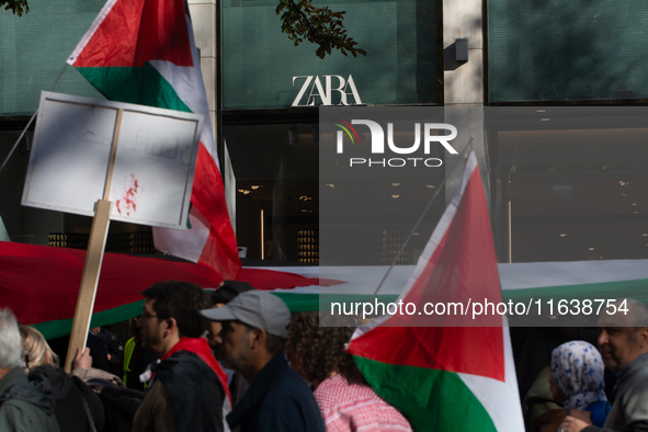 A thousand protesters take part in a protest demanding a ceasefire and opposing ongoing Israeli attacks on Gaza and Lebanon in Duesseldorf,...