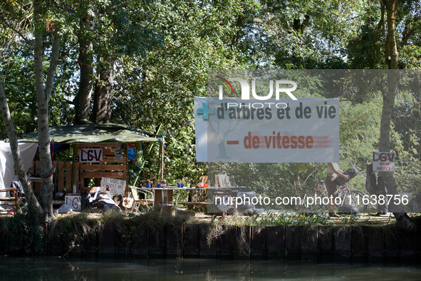 A general view of the ZAD on the Canal du Midi near Toulouse, France, on October 4, 2024. Banners read 'LGV no thanks' (right) and 'More tre...