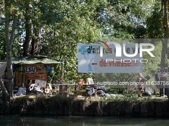 A general view of the ZAD on the Canal du Midi near Toulouse, France, on October 4, 2024. Banners read 'LGV no thanks' (right) and 'More tre...