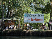 A general view of the ZAD on the Canal du Midi near Toulouse, France, on October 4, 2024. Banners read 'LGV no thanks' (right) and 'More tre...